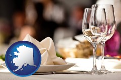 alaska map icon and a restaurant table place setting