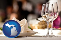 michigan map icon and a restaurant table place setting