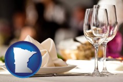 minnesota map icon and a restaurant table place setting