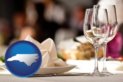 north-carolina map icon and a restaurant table place setting
