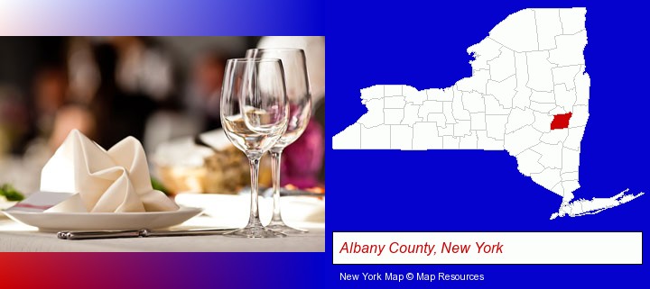 a restaurant table place setting; Albany County, New York highlighted in red on a map