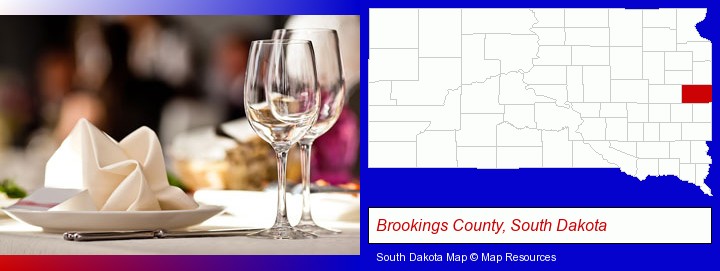 a restaurant table place setting; Brookings County, South Dakota highlighted in red on a map