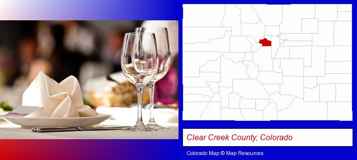 a restaurant table place setting; Clear Creek County, Colorado highlighted in red on a map