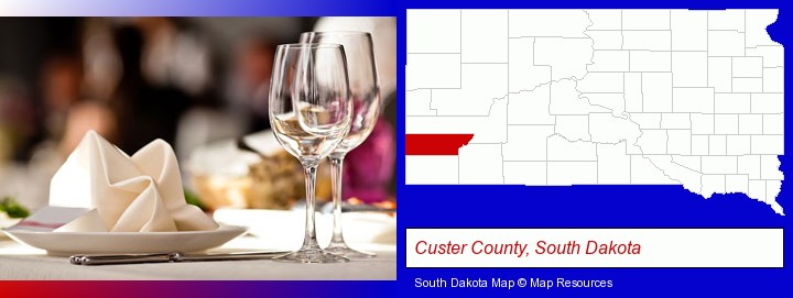 a restaurant table place setting; Custer County, South Dakota highlighted in red on a map