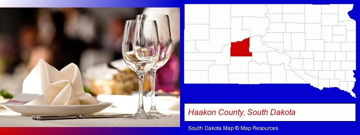 a restaurant table place setting; Haakon County, South Dakota highlighted in red on a map