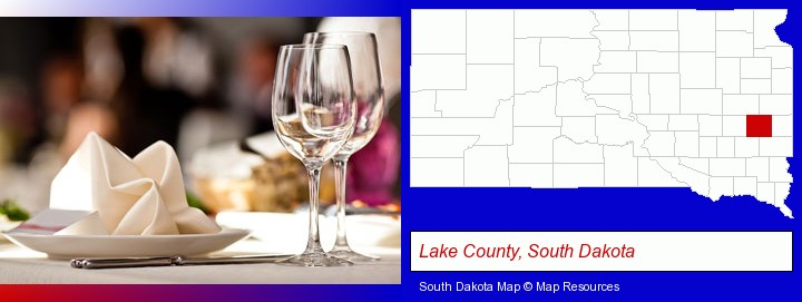 a restaurant table place setting; Lake County, South Dakota highlighted in red on a map