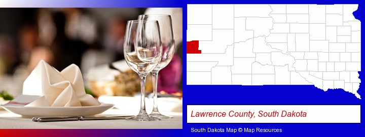 a restaurant table place setting; Lawrence County, South Dakota highlighted in red on a map