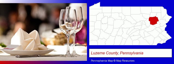 a restaurant table place setting; Luzerne County, Pennsylvania highlighted in red on a map