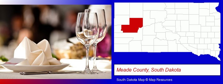 a restaurant table place setting; Meade County, South Dakota highlighted in red on a map